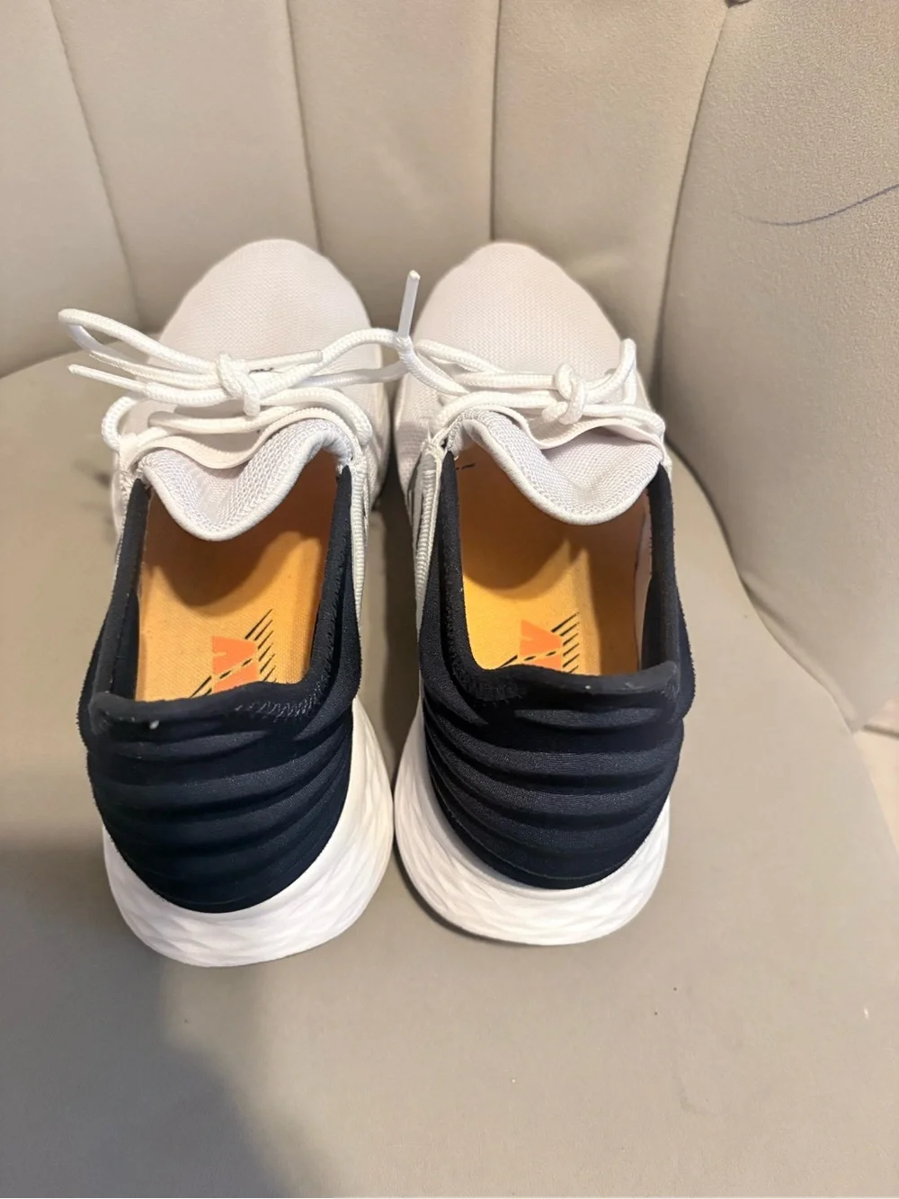 New Balance White and Navy Athletic Sneakers